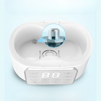 Chauffe-biberon multifonction blanc avec panneau de contrôle digital.